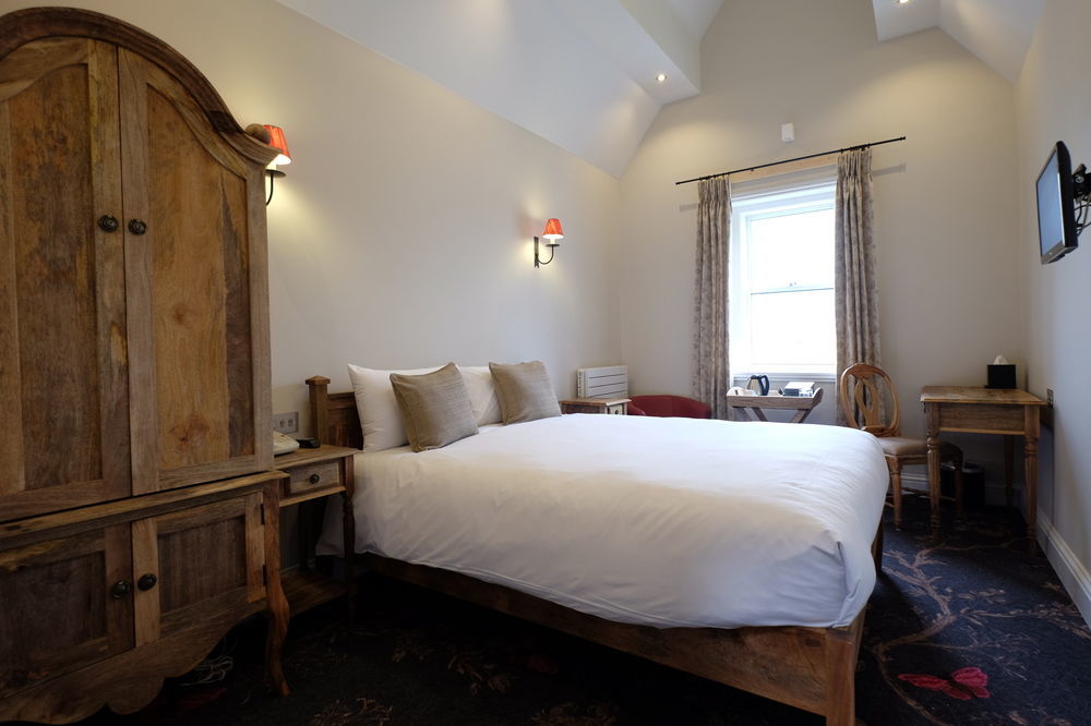 Cotswold Grange Bed & Breakfast Cheltenham Bagian luar foto A room at the hotel